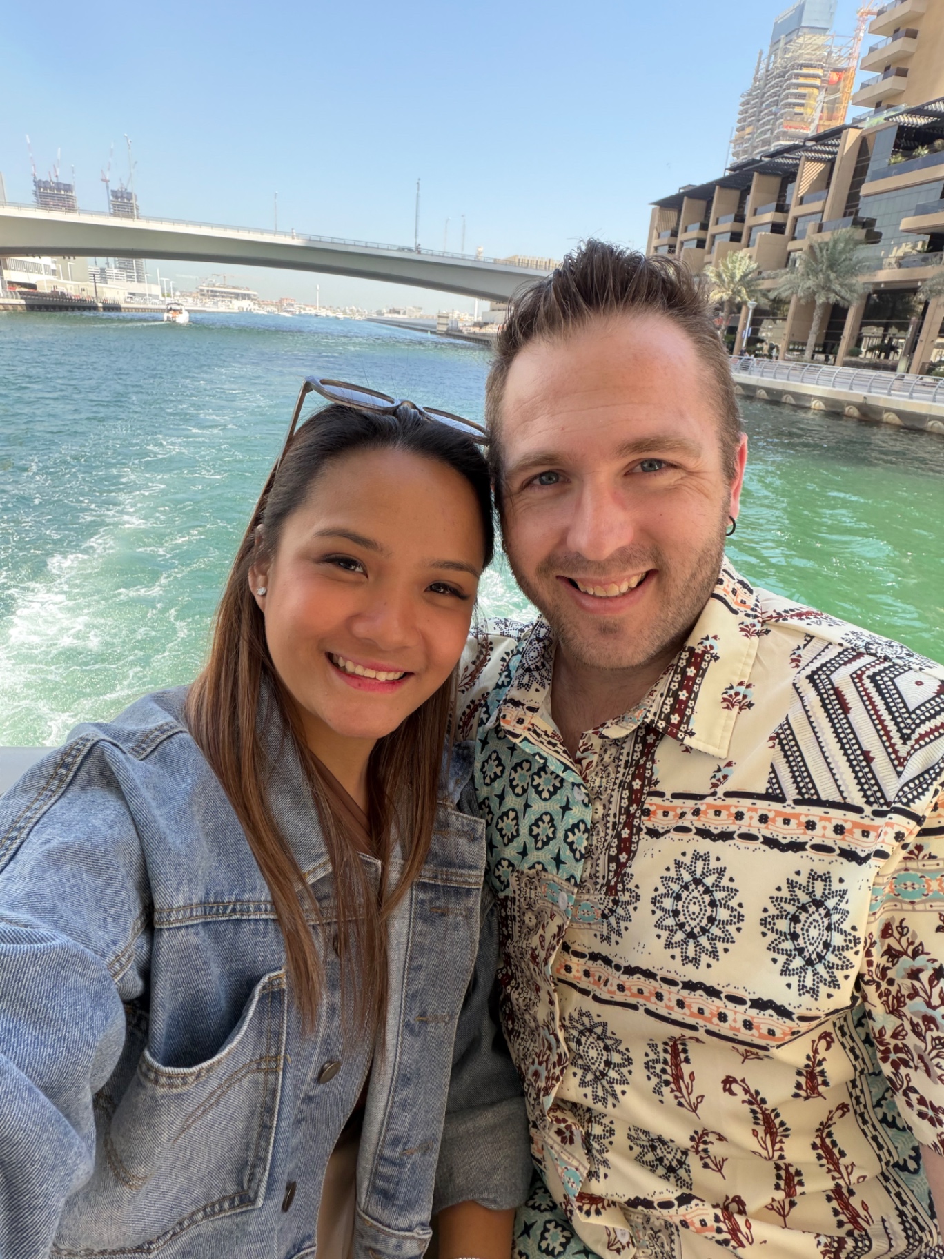 Andrew Carlson and his wife exploring a city canal